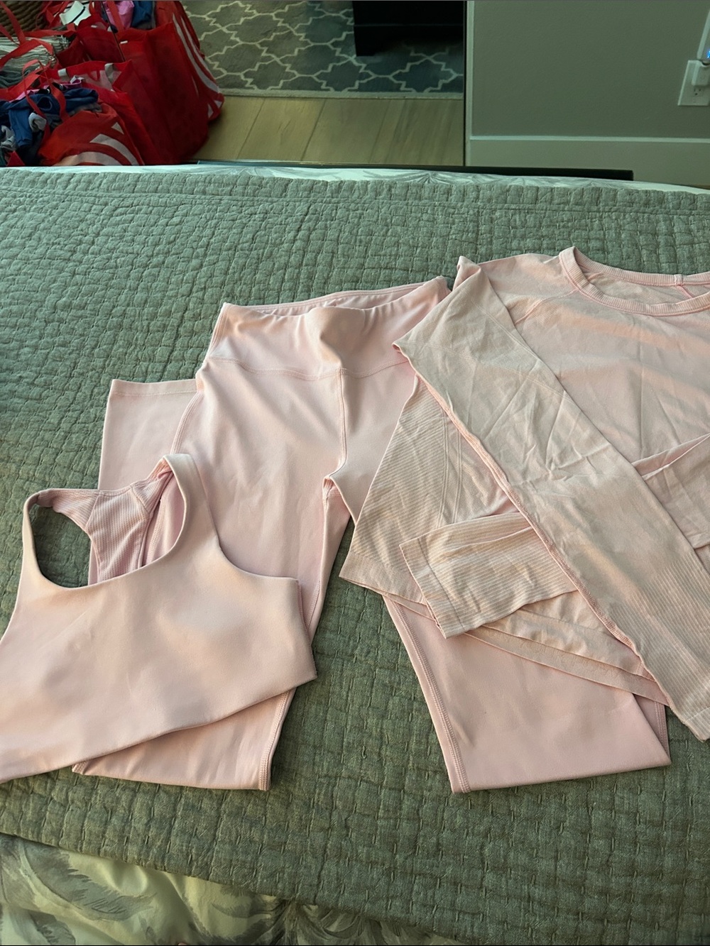 Athleta Girl Light Pink Set incl top, flare pants and sports bra in size large.